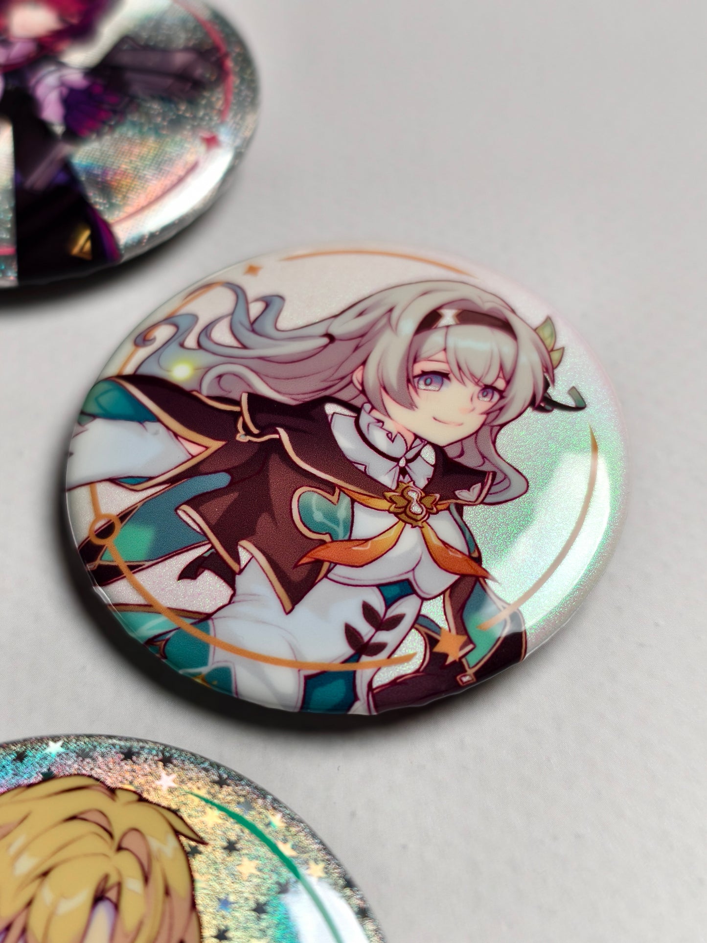 Firefly from Honkai Star Rail pinback button badge with soft illustration style on a white background.