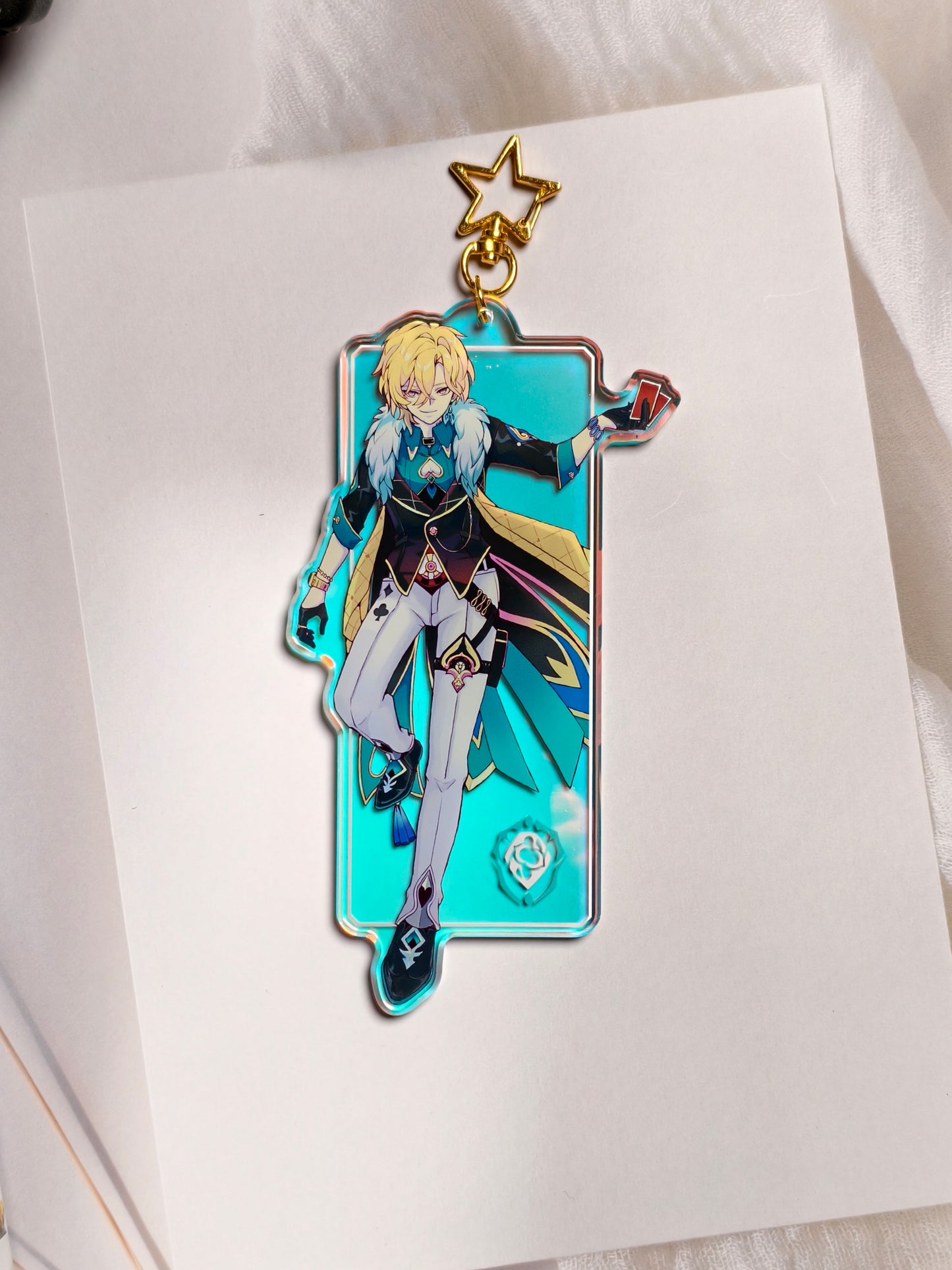Aventurine from Honkai Star Rail rainbow holographic acrylic bag charm styled with gold star clasp.