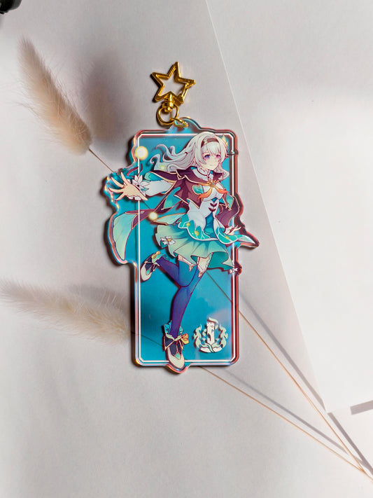 Firefly from Honkai Star Rail rainbow holographic acrylic bag charm styled with gold star clasp.