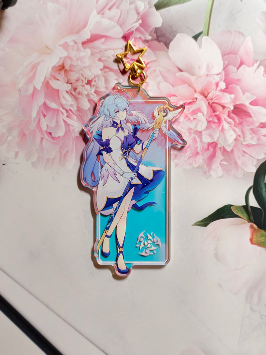 Robin from Honkai Star Rail rainbow holographic acrylic bag charm styled with gold star clasp.