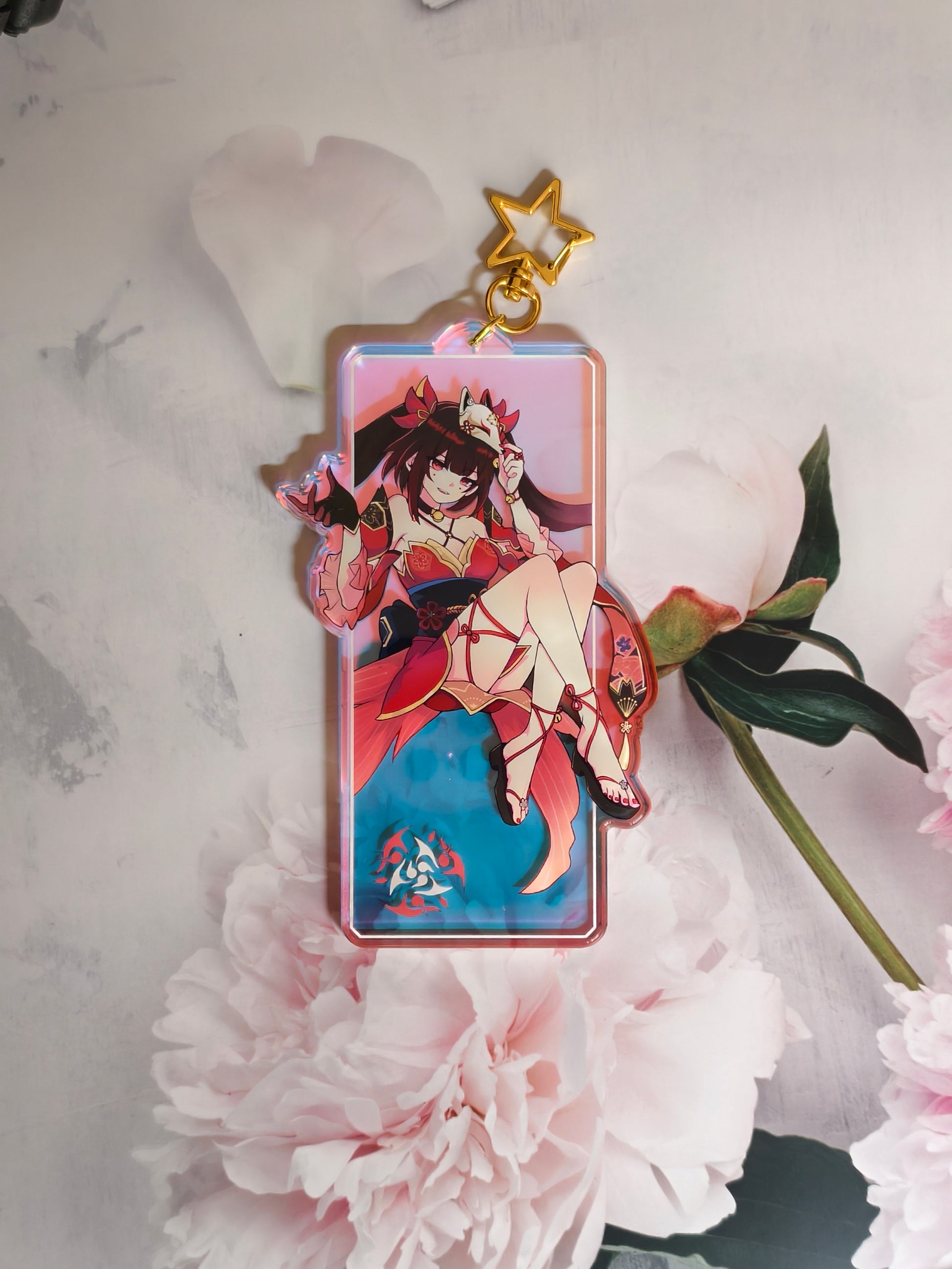Sparkle from Honkai Star Rail rainbow holographic acrylic bag charm styled with gold star clasp.